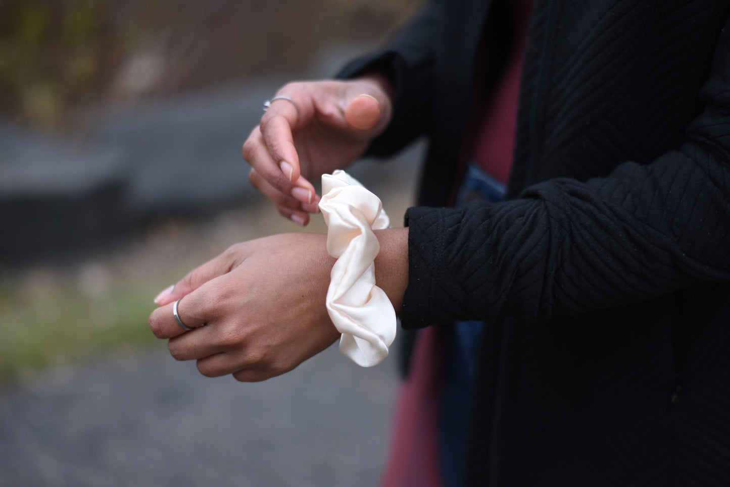 "Aroma Loops scrunchie showcasing sustainable, fragrance-infused hair accessory."