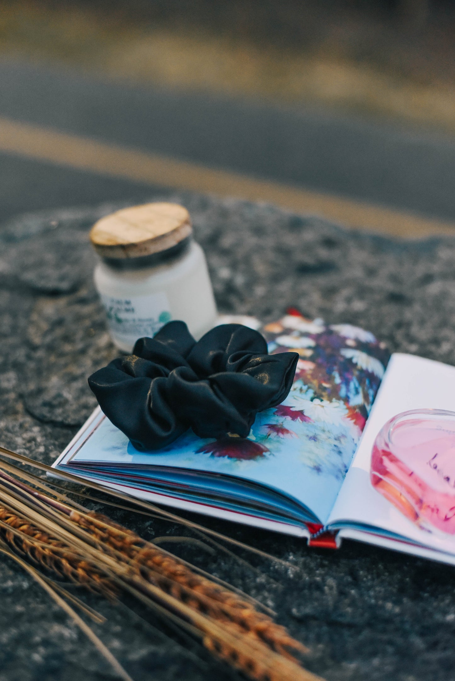 "Eco-friendly fragrance-infused scrunchie by Aroma Loops for hair wellness and style."